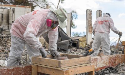 Volunteers sift through properties on Maui after wildfires destroyed many homes across the island.