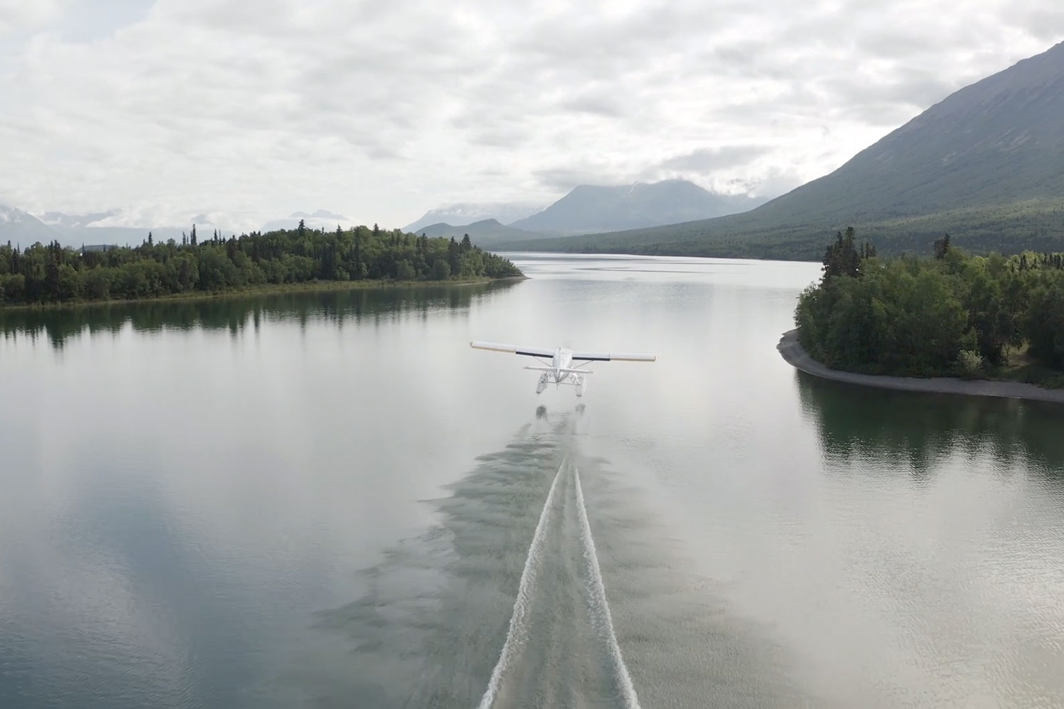 The Otter floatplane takes off for a morning flight across the Lake Clark wilderness.